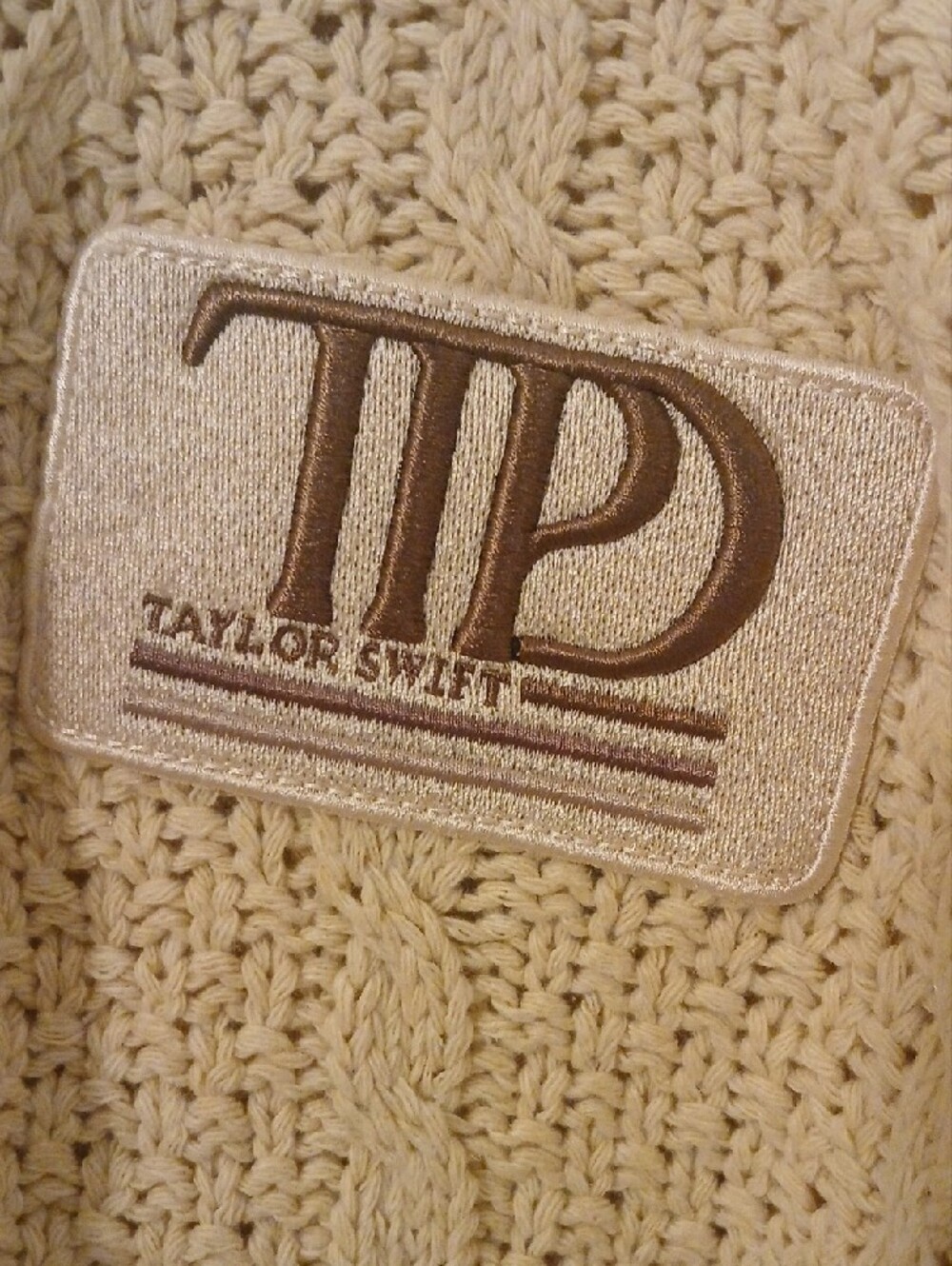 Taylor Swift Ladies Cream Cable Knit Cardigan with Brown Trim & Embroidery. - Picture 3 of 11